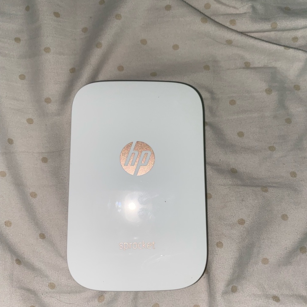 HP sprocket printer. Prints polaroids from Phone